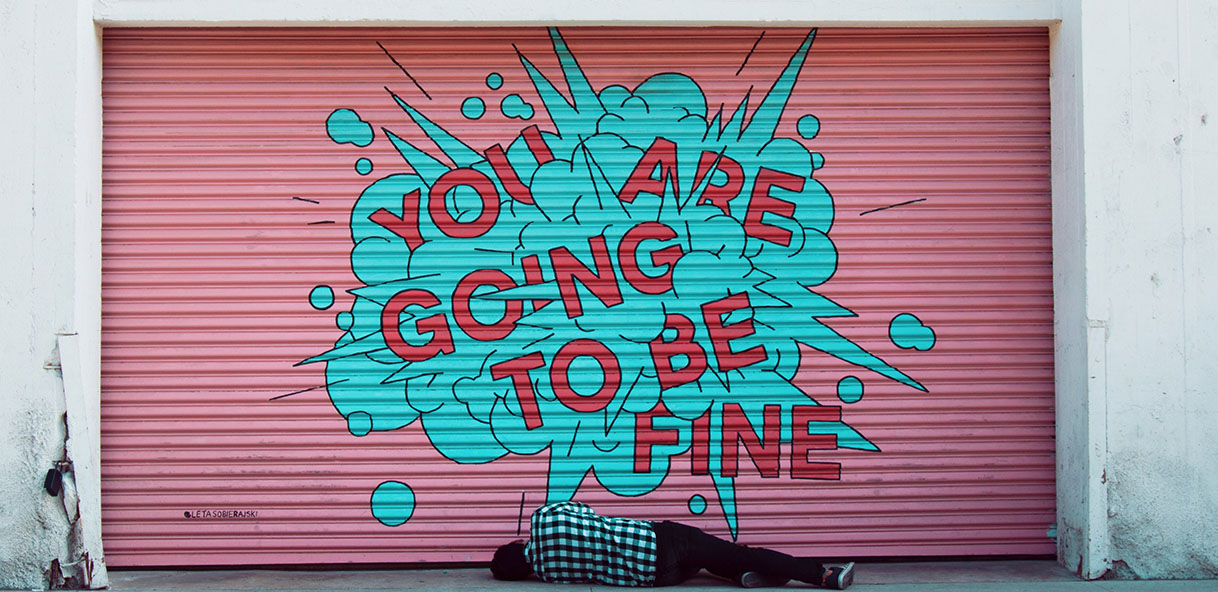 "You are going to be fine" graffiti on a door, which is going to be even more accurate after the Google AI update.