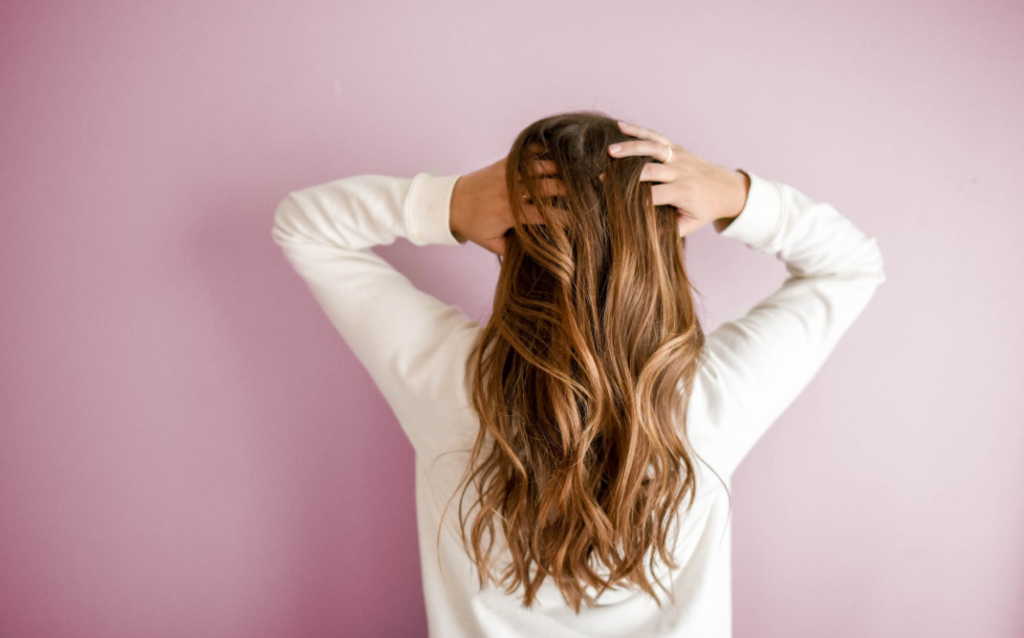 Woman with hands on her head, wondering about updates to Ads Manager and Business Manager